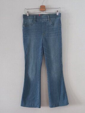 SPANX flared medium wash jeans hemmed size M